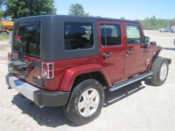 JEEP WRANGLER UNLIMITED 2010 Rouge Sahara  Full équip!!! Cuir 2 tons