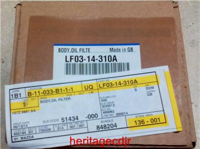 Mazda Oil Filter Housing With Gasket **OEM** **NEW** ( LF0314310A